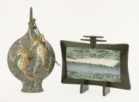 Lot 259 - A stoneware glazed 'seahorse' moon flask