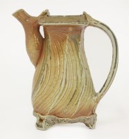 Lot 261 - A glazed stoneware water jug