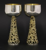 Lot 239 - A pair of silver and silver gilt goblets
