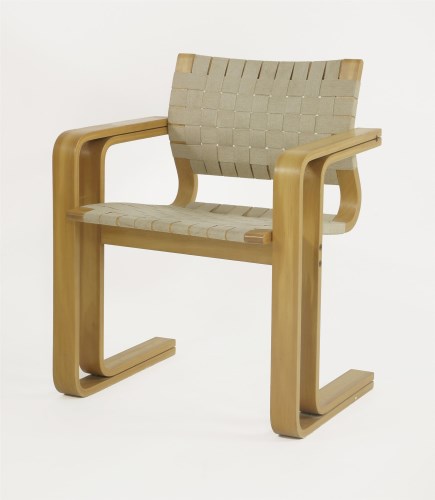 Lot 325 - A laminated cantilever elbow chair