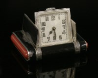 Lot 159 - A sterling silver Art Deco enamel Tavannes mechanical purse watch