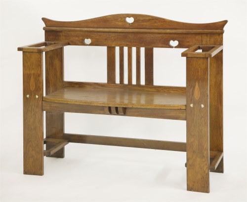 Lot 54 - An Arts and Crafts oak hall seat
