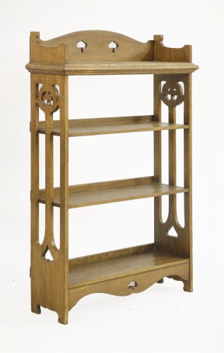 Lot 71 - An Arts and Crafts oak four-tier open bookcase