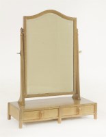 Lot 99 - A Gordon Russell oak toilet mirror