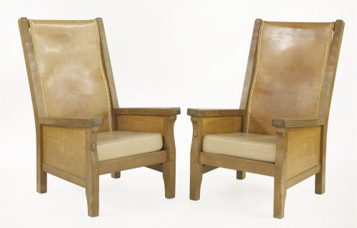 Lot 125 - A pair of Robert 'Mouseman' Thompson oak smokers' chairs