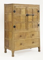 Lot 135 - A Robert 'Mouseman' Thompson oak cabinet or tallboy