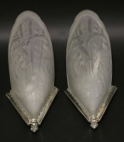 Lot 203 - A pair of chrome-plated wall lights