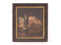Lot 559 - A late 19th century Dutch School scene of figures in candlelight
