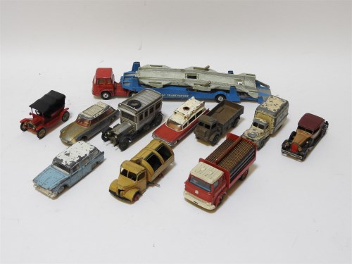 Lot 437 - A quantity of play worn die cast Dinky Corgi and other cars