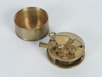 Lot 210 - A brass drum cased pocket sextant