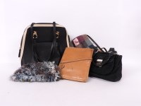 Lot 355 - A collection of handbags to include: a Radley tan leather cross-over body handbag