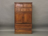 Lot 659 - A 20th century elm kimono wardrobe