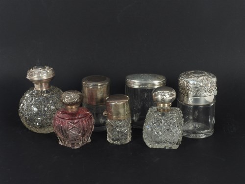 Lot 98 - Seven various silver topped glass scent bottles