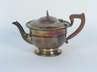 Lot 174 - A hallmarked silver teapot