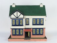Lot 425 - A vintage hand painted dolls house