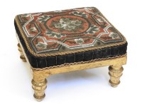 Lot 599 - A Victorian gilt wood footstool