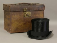 Lot 1198 - A black silk top hat