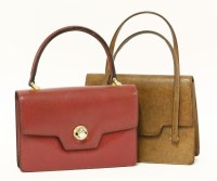 Lot 1269 - A Gucci vintage red leather handbag