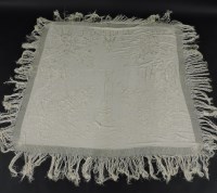 Lot 1201 - A cream piano shawl
