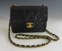 Lot 1249 - A Chanel vintage black quilted lambskin flap shoulder mini bag