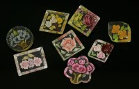 Lot 1027 - A collection of eight reverse-painted Lucite brooches