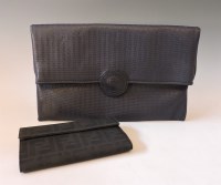 Lot 1261 - A Fendi navy embossed striped leather fold-over clutch bag