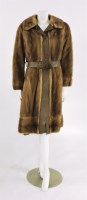 Lot 1109 - A mink fur and tan leather coat
