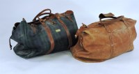 Lot 1312 - A Coach tan leather large travel bag