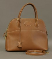 Lot 1279 - An Hermès 'Bolide 35' tan leather bag