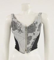 Lot 1148 - A Vivienne Westwood 'Anglomania' white printed patterned denim and black elasticated mesh bustier top