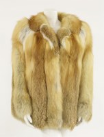 Lot 1121 - A bi-coloured fox fur jacket
