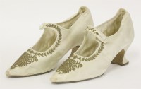 Lot 1090 - A pair of cream silk ladies' shoes