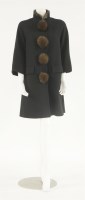Lot 1166 - An Aquascutum black crêpe wool coat