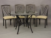 Lot 645 - A black painted metal and glass conservatory table
