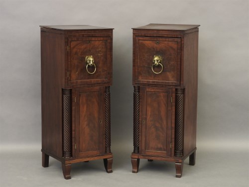 Lot 594 - A pair of George III bedside cupboards