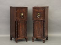 Lot 594 - A pair of George III bedside cupboards