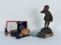 Lot 96 - A spelter figure of a young girl