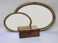 Lot 575A - Two oval gilt mirrors