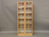 Lot 640 - A Habitat oak display cabinet