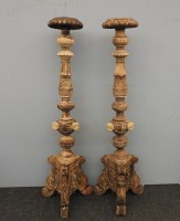 Lot 652 - A pair of stripped torcheres