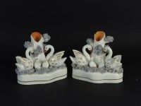 Lot 321 - A pair of Staffordshire spill vases