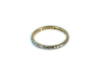 Lot 1 - A 22ct gold hand engraved wedding ring