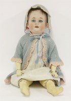 Lot 465 - A porcelain headed doll with 'crossed swords' mark to head