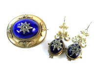 Lot 43 - A Victorian gilt metal raised blue guilloche enamel brooch and earring suite