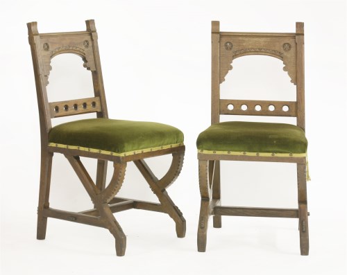 Lot 9 - A set of six oak side chairs