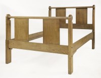 Lot 60 - A walnut double bed