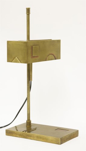 Lot 214 - A brass and copper desk lamp