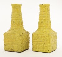 Lot 402 - A pair of stoneware yellow-glazed vases