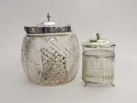 Lot 175 - A cut glass biscuit barrel with silver cover