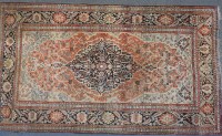 Lot 582 - A large Persian Heriz carpet
